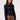 Blue Revival Annabelle cropped denim jacket in dark rinse with brown faux-suede trim and gold buttons.