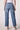 Blue Revival Beau button down jeans in Ora, back view showing the straight-leg ankle fit and raw hem.