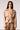 Blue Revival Charli cropped scuba trench in camel, featuring oversized decorative buttons and a tie belt.