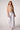 Blue Revival Chloe cropped hooded blazer in camel with removable white hoodie insert styled with Sadie Jean.