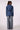 Blue Revival Gracie trench coat in medium stone without removable hoodie insert, back view showing the fitted silhouette and belted waist.