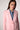 Close-up of the Blue Revival Helen blazer in pale pink showing the silver buttons and removable denim insert detail.