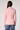 Blue Revival Helen blazer with removable denim insert in pale pink, back view showing the fitted silhouette and layered denim insert.