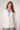 Blue Revival Helen blazer with removable blue striped shirt insert in whipped cream, featuring a fitted silhouette and front flap pockets.