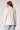 Blue Revival Helen blazer with removable blue striped shirt insert in whipped cream, back view showing the fitted blazer silhouette.