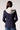 Blue Revival Helen double breasted blazer with removable grey hoodie insert in navy, back view showing the fitted silhouette and grey hoodie insert.