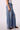 Blue Revival Liv drawstring wide leg pants in San Marino, side view showing the wide-leg silhouette and mid-rise fit.