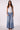 Woman wearing the Blue Revival Liv drawstring wide leg pants in San Marino with a relaxed, flowy silhouette.