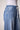 Close-up of the Blue Revival Liv wide leg pants in San Marino showing the adjustable drawstring waist.