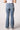 Blue Revival Maya mid-rise seamed bootcut jeans in Medium Tel Aviv, back view showing the classic five-pocket design and bootcut leg.