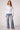 Blue Revival Piper peplum jacket in white styled with the Waverly Dallas jean for a polished, contemporary look.
