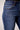 Close-up of Blue Revival Quinn mid-rise jeans in Marrakesh showing the waistband, button closure and classic denim construction.