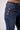 Blue Revival Sailor dark-wash bootcut jeans with close-up of gold-tone button pocket detailing.