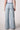 Blue Revival Scarlett drawstring utility wide leg pants in Brussels, back view showing the wide-leg silhouette and waistband.