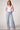 Woman wearing the Blue Revival Scarlett drawstring utility wide leg pants in Brussels with a relaxed wide-leg silhouette.