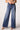 Blue Revival Selena mid-rise recycled wide-leg jeans in Prague, featuring a wide-leg silhouette and button front pockets.